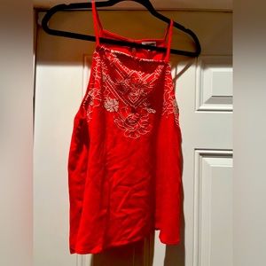 Cute sleeveless shirt never worn!